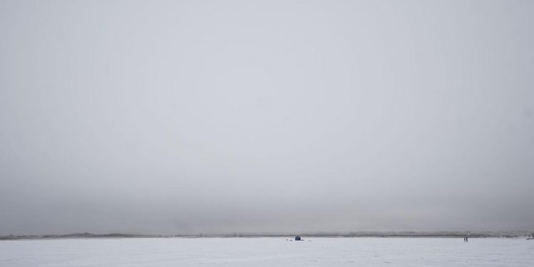 Ice fishing offers incredible beauty, harsh conditions and the ever-present possibility of big fish | Open Spaces